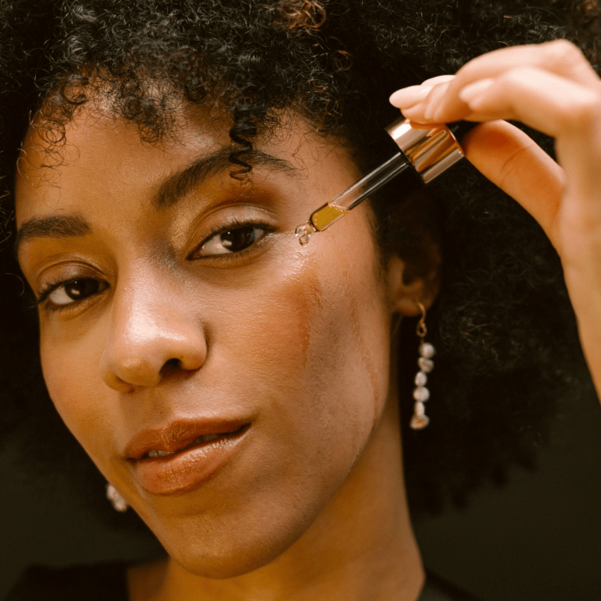 Glory Oil on cheek - Eco By Sonya Australia